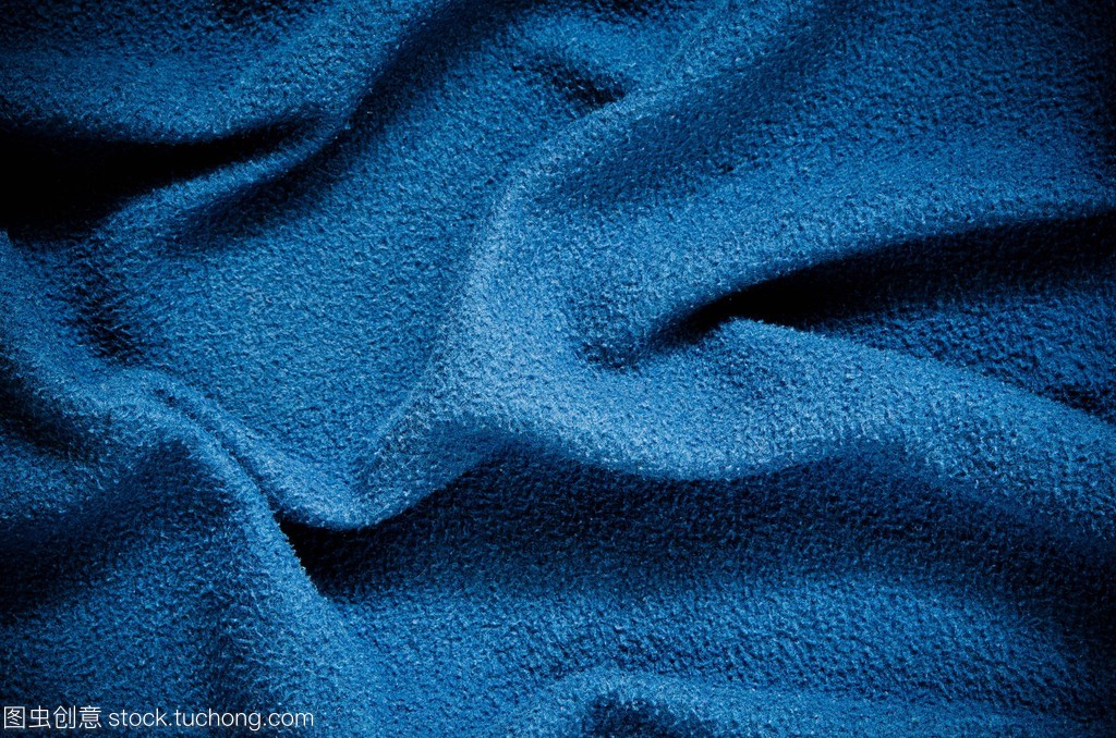 蓝色皱的织物纹理 棉布的独特魅力